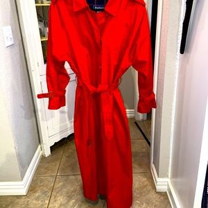 Red Burberry trench coat. Fits 12-16 US sizing.